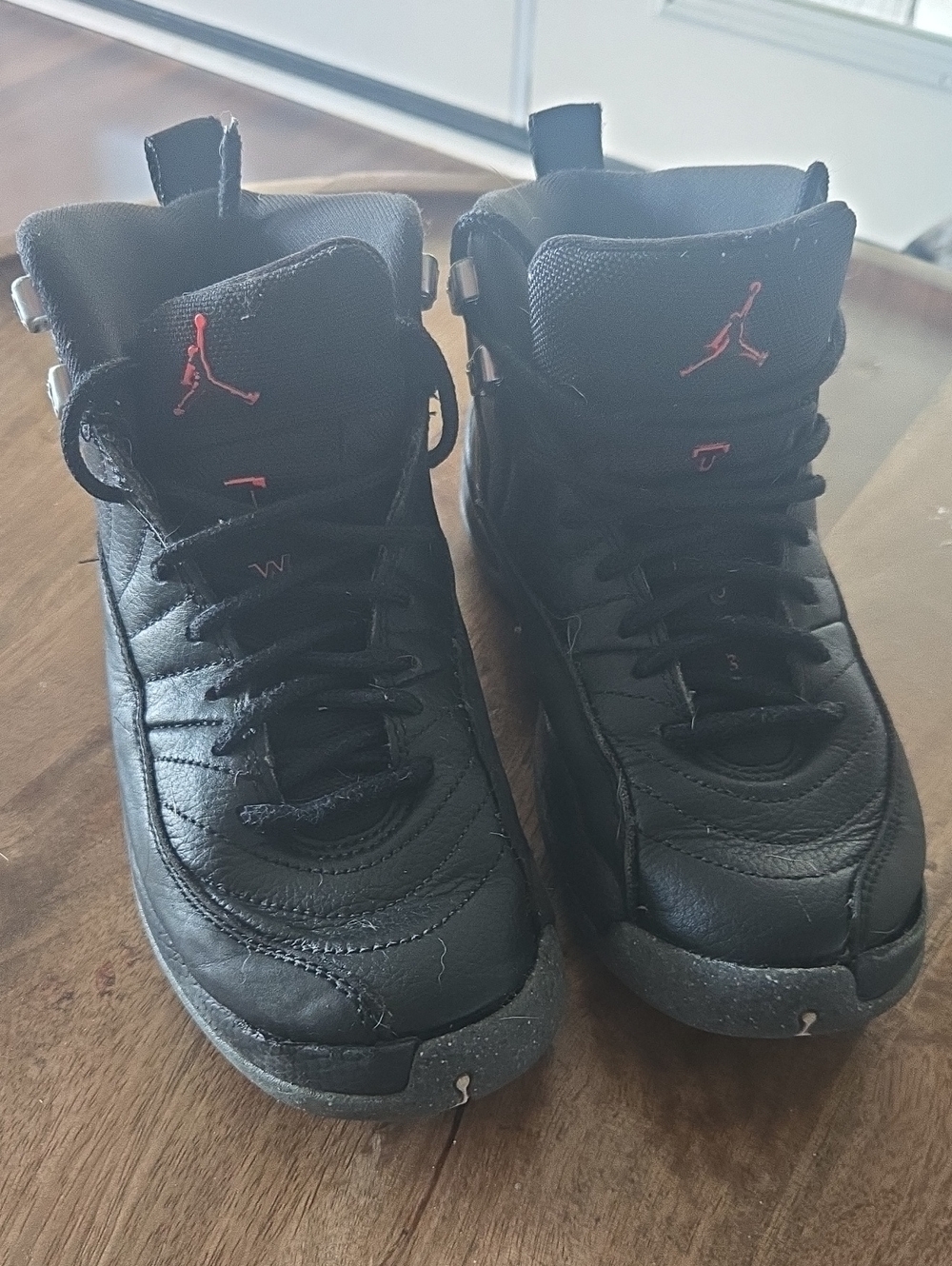 Jordan Kids Black Sneakers with Red Jumpman Accents